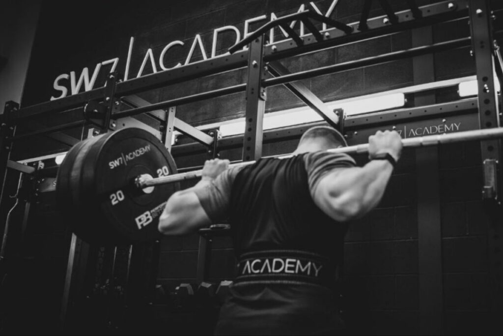 Man lifting a barbell.