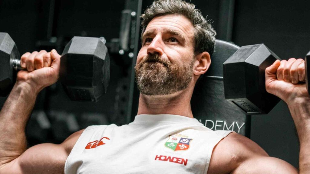 Man lifting dumbbells.